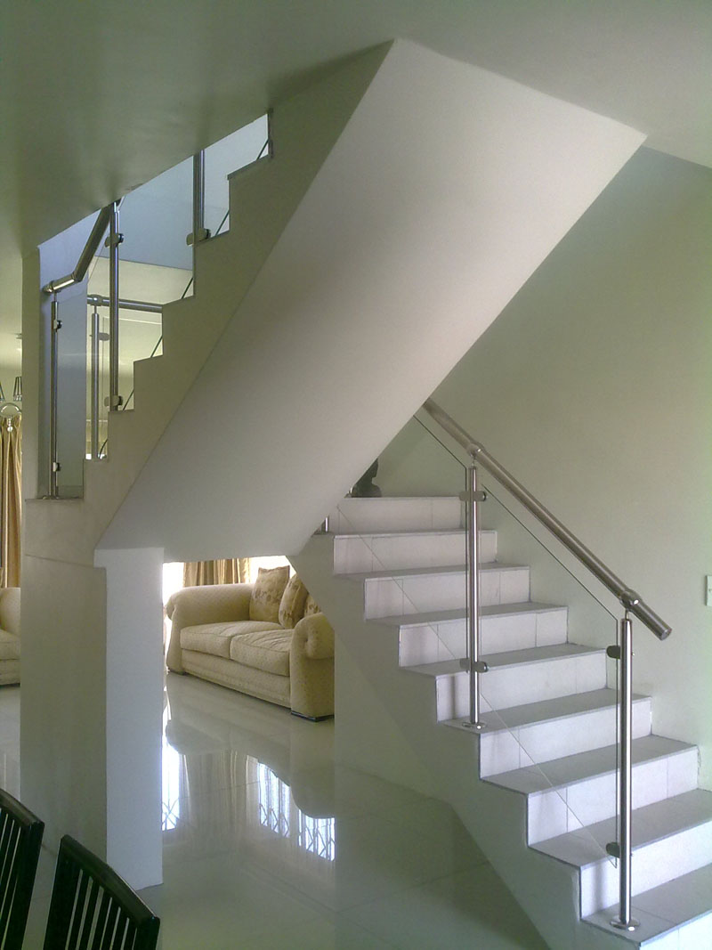 Bild rostfritt trappräcke glas inomhus